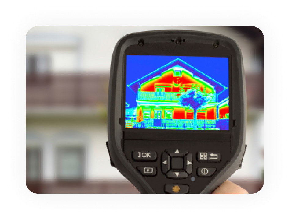 Worker drawing on plans